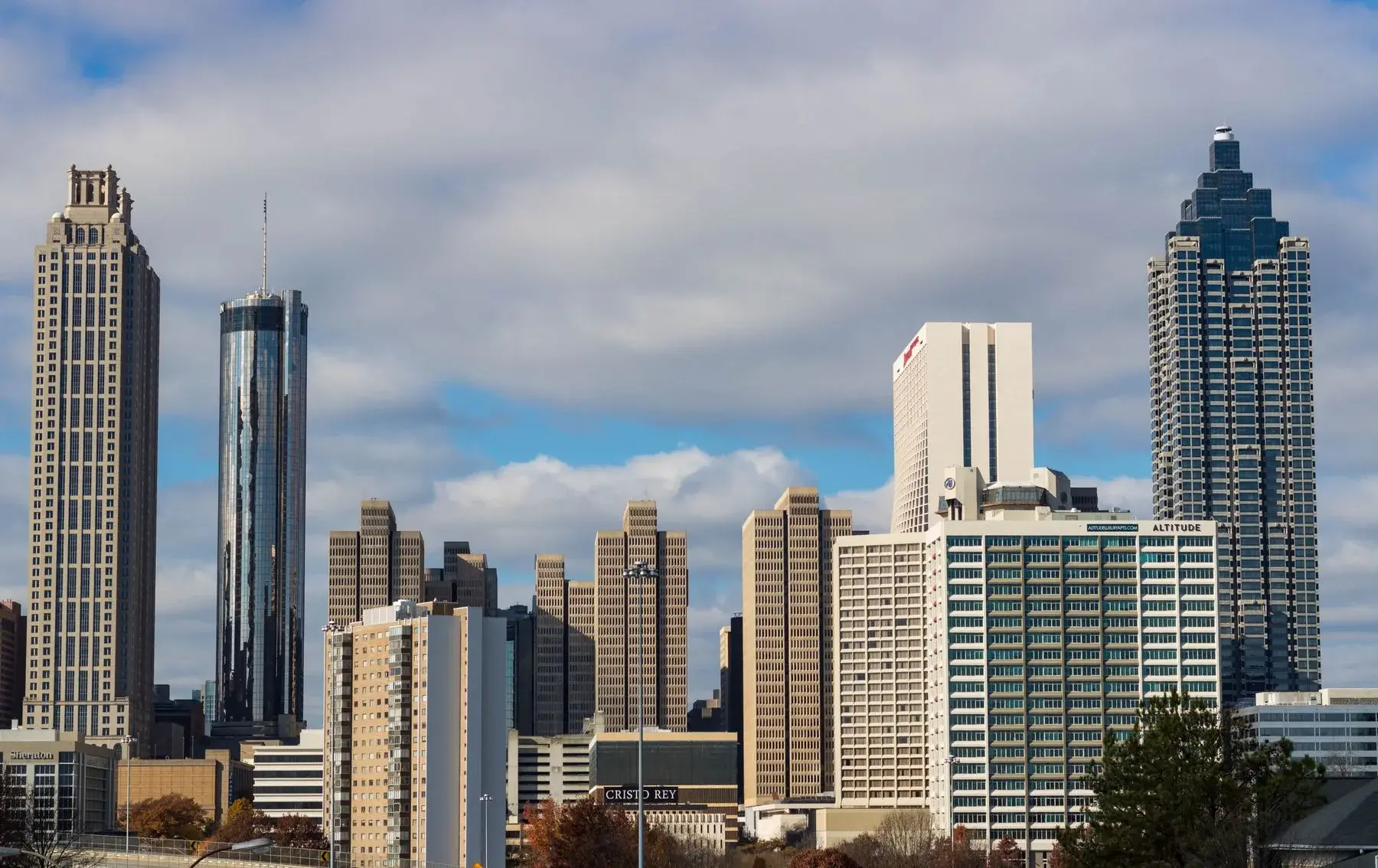 The Atlanta skyline under a blue sky